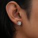 white gold 1 carat diamond stud earrings with halo square shape on ear