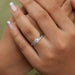 round-cut lab-grown diamond bridal ring set with white gold band on model's finger