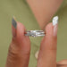 close view of round-cut lab-grown diamond bridal ring set with white gold band