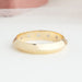 top view of round cut hidden yellow gold mens wedding bands with diamonds