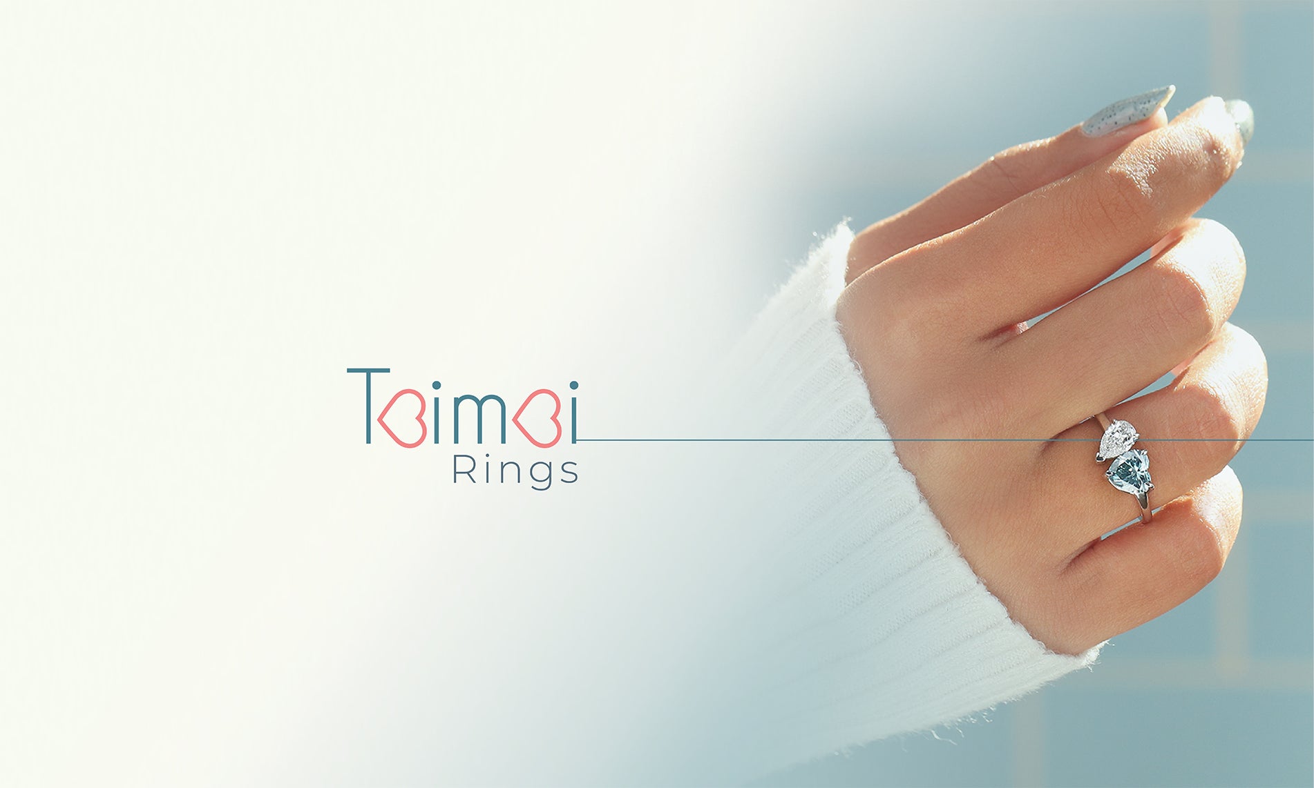 Image showing Toi et Moi ring with silver and gold metal tones, featuring two lab-grown colored diamonds set side by side in an elegant design