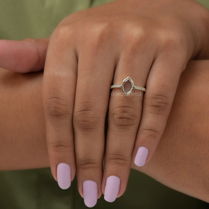 In finger front look of antique diamond engagement ring