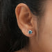blue round cut diamond 4 prong setting solitaire stud earrings white gold in ear
