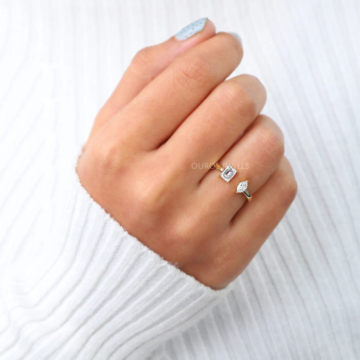 emerald and marquise-cut lab diamond open cuff wedding band on model's finger