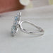 14k white gold curved shank of flower style lab made diamond engagement ring