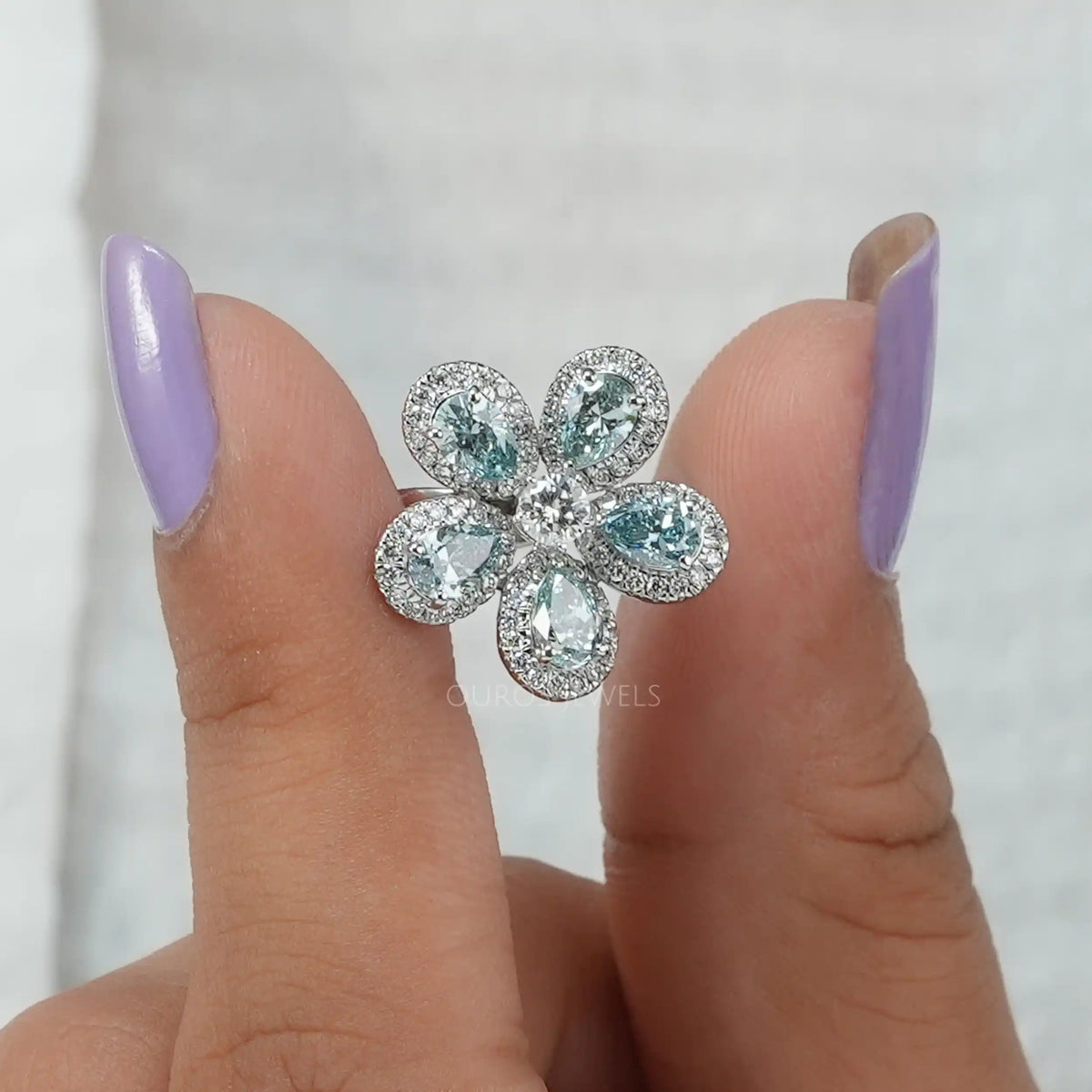 Light Blue Pear Diamond Halo Ring