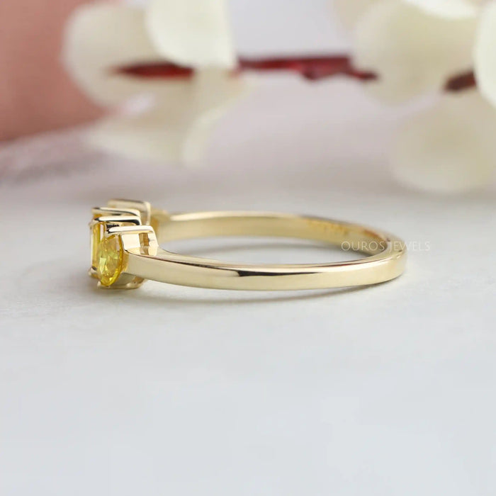14k yellow gold shank of vintage emerald and marquise diamond engagement ring