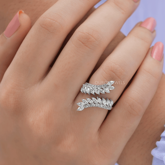 marquise-cut lab-grown diamond bypass engagement ring in finger