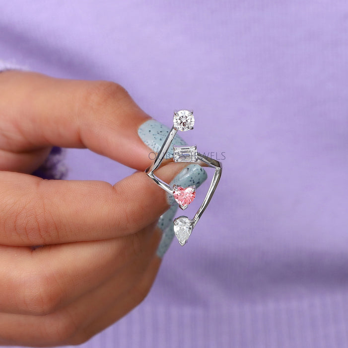 close view of multi shape diamond bypass engagement ring white gold