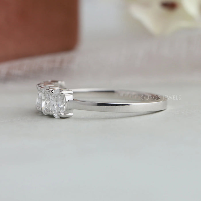 side view of oval cut lab grown diamond five stone wedding ring