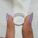 close view of oval cut lab grown diamond five stone wedding ring