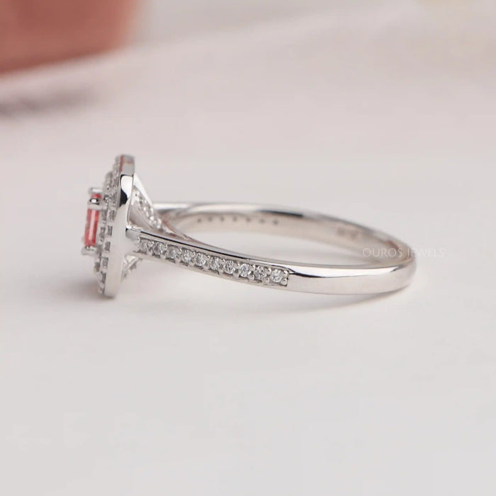 Round accent stone studded on pink princess double halo engagement ring