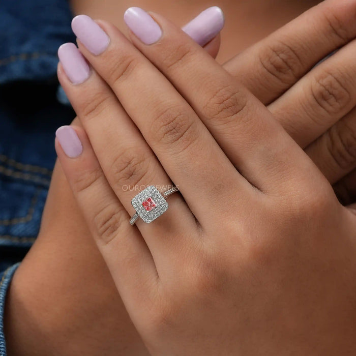 In finger front look of fancy pink princess diamond engagement ring