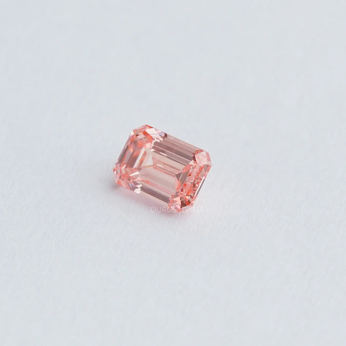 side view of pink emerald cut lab diamond loose