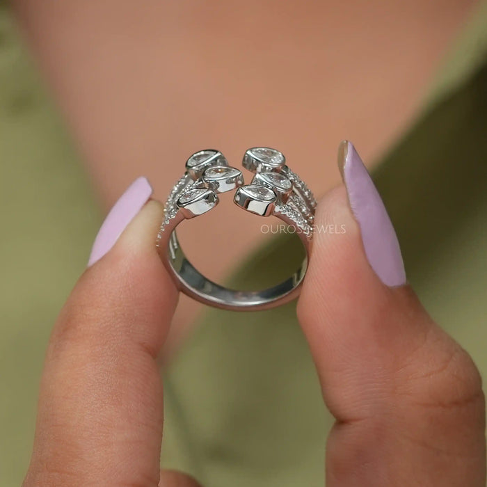 Close up look of  row pear shaped eco friendly lab diamond engagement ring