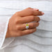 pear and yellow radiant-cut lab diamond toi et moi wedding ring in finger