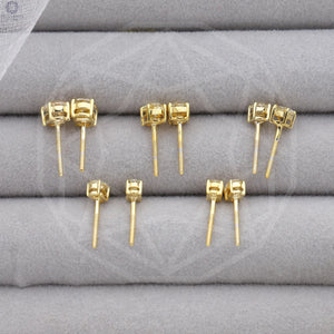 Yellow gold screw back lab diamond studs with oval shaped lab diamonds