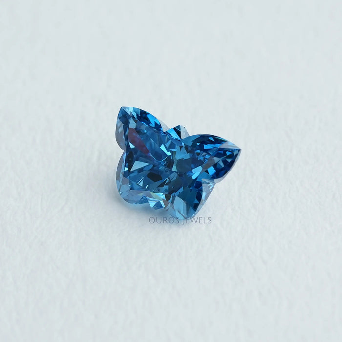 top view of 0.55 carat blue butterfly cut lab created loose diamond