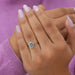 In finger look of blue pear shaped lab created diamond engagement ring  with split shank 