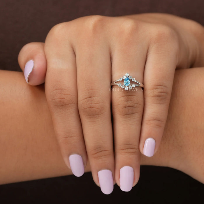 Pear shaped lab created diamond engagement ring with split shank made with round diamonds