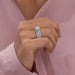 side view of round-cut lab diamond solitaire 3 bridal ring set on model's finger
