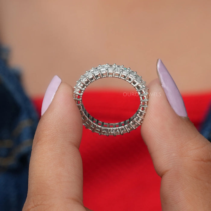 Prong Set Setting Of Emerald Cut Full Eternity Anniversary Band