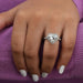 heart cut lab diamond halo engagement ring in finger