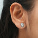 In ear look of marquise cut lab created diamond stud earrings