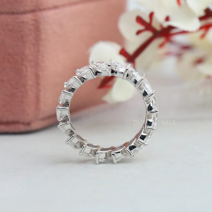 side view marquise cut lab made diamond white gold eternity band engagement ring