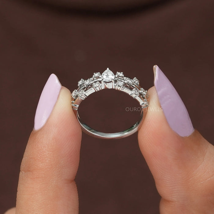 Pear shaped solitaire with accents women's diamond engagement ring, ideal for parties and functions