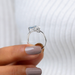 close view of blue princess-cut and pear lab diamond toi et moi wedding ring