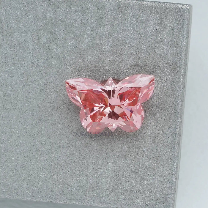 top view of 0.50 carat loose lab created pink diamond butterfly cut