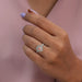 pink heart cut lab diamond double halo engagement ring on model's finger