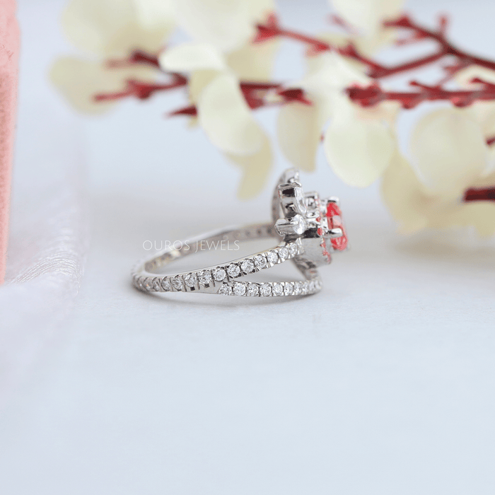 side view of pink heart-cut lab-grown diamond halo wedding ring