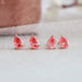 top view pink pear shaped diamond solitaire martini setting stud earrings rose gold