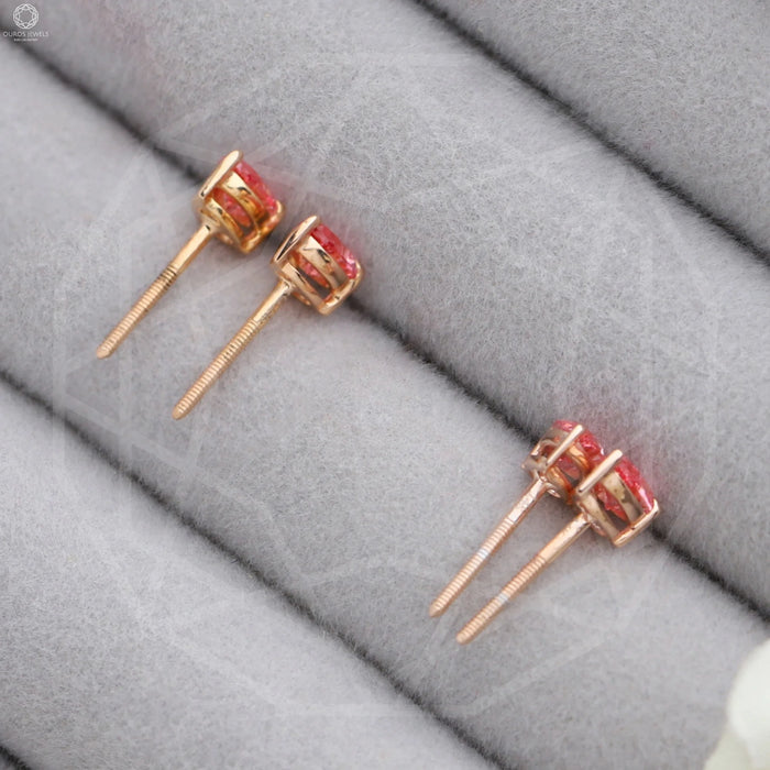 back view pink pear shaped diamond basket setting screw back stud earrings