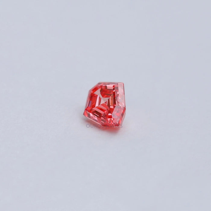 side view of pink shield cut manufatured diamond loose
