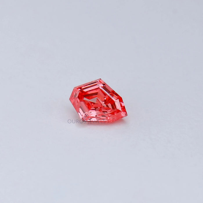 side view of pink shield cut lab created diamond loose