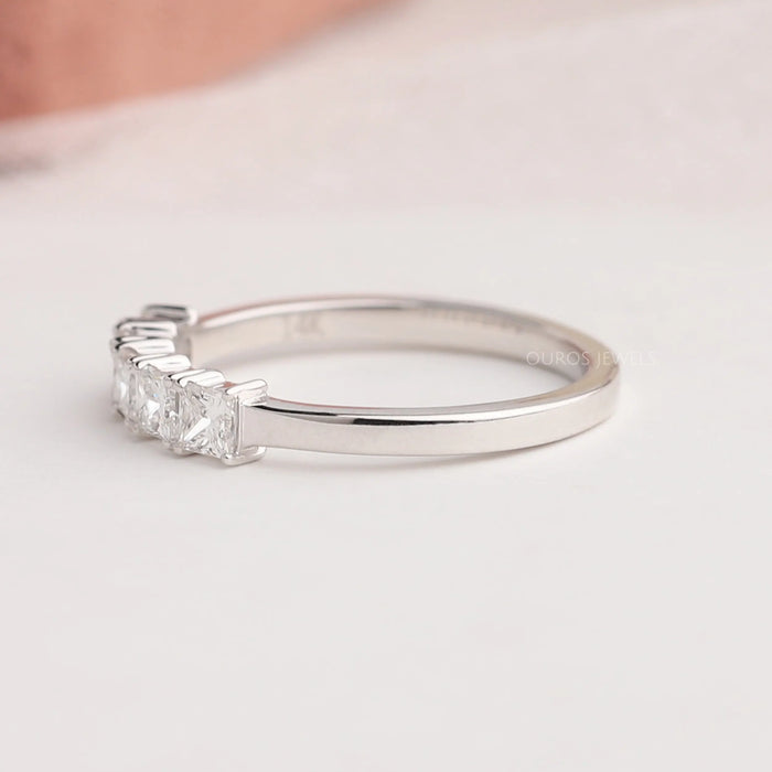 side view of princess cut diamond five stone wedding ring with white gold band