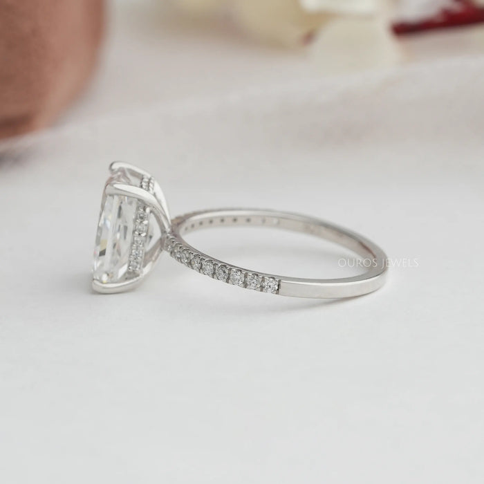 side view of radiant cut diamond hidden halo solitaire wedding ring white gold
