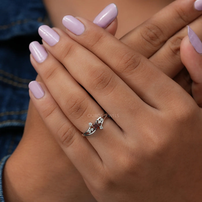Cross hand finger view of cushion cut cluster diamond ring inspired by classic & unique wedding & vintage ring.