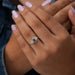 In finger front look of fancy colored diamond engagement ring