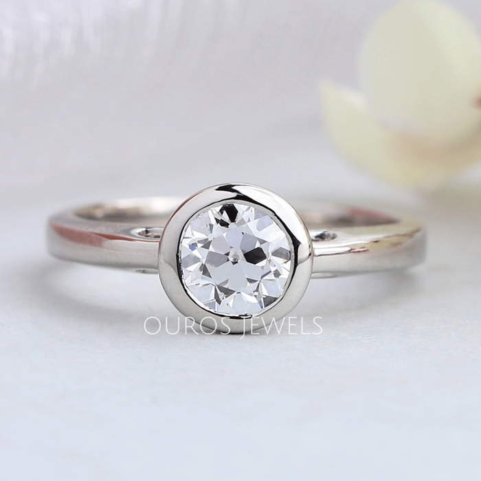 front view of old european round cut diamond bezel set engagement ring