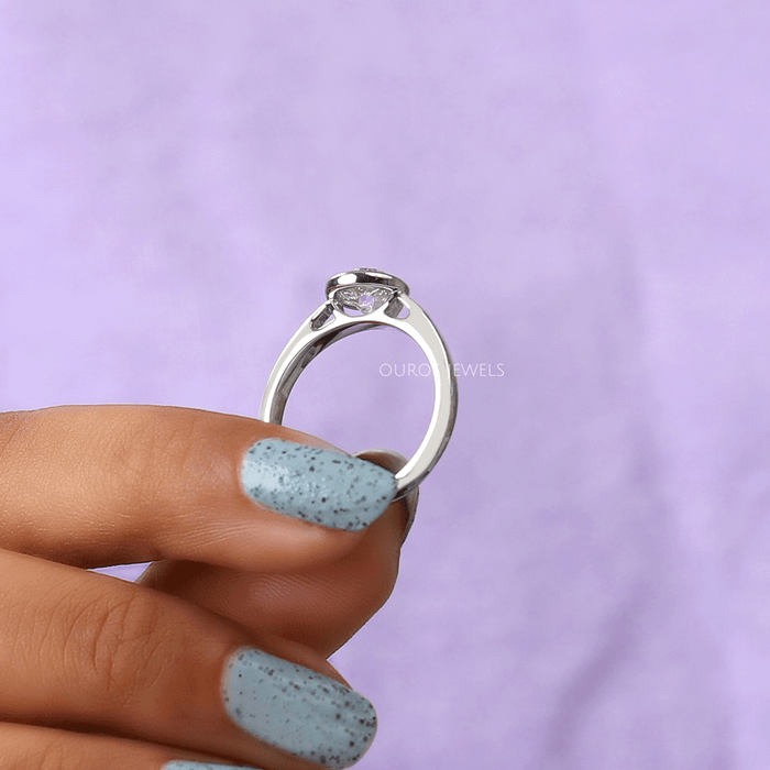 back side view of old european round cut diamond bezel set engagement ring