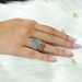round-cut lab-grown diamond multi-row bypass engagement ring on model's finger