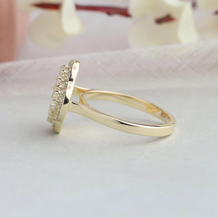 side view of round shaped lab diamond floral halo engagement ring gold