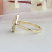 side view of round shaped lab diamond floral halo engagement ring gold