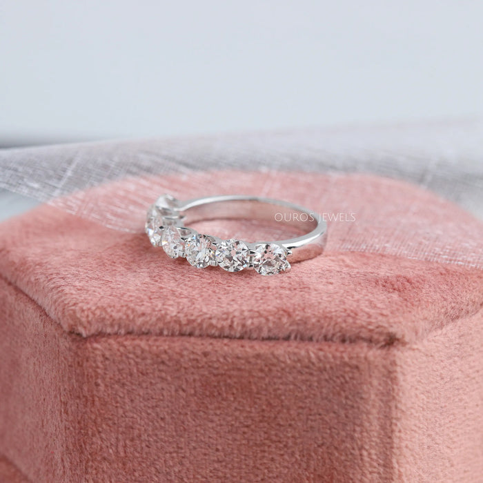 side view baguette and round diamond half u prong eternity band white gold