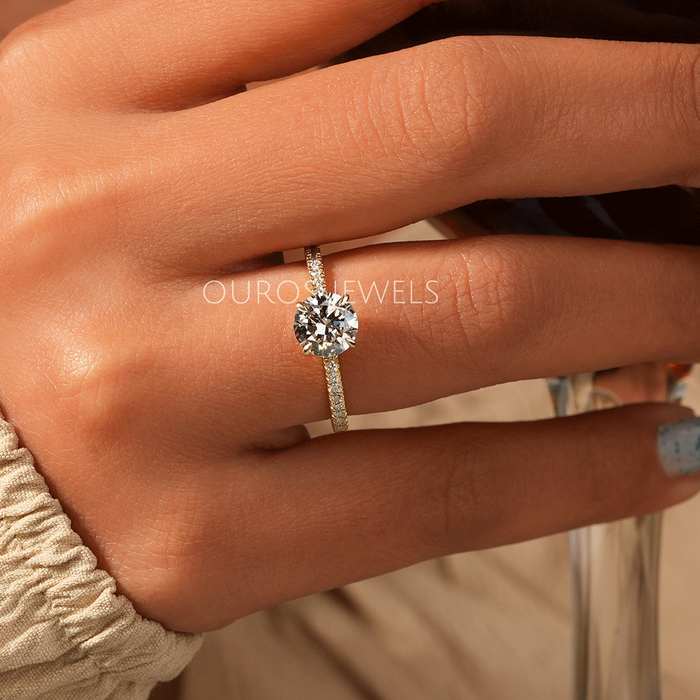 round cut lab diamond solitaire hidden halo engagement ring in finger