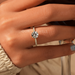 round cut lab diamond solitaire hidden halo engagement ring in finger